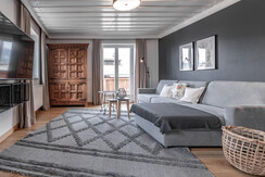 Wohnzimmer mit ausziehbarem Sofa - Appartement #2